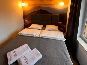 Apartamenty i Chata Drewno i Kamień